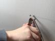 Schrauben der alten Lampe entfernen